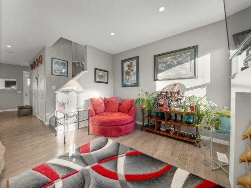 33 Amery Green, Crossfield, AB - Indoor Photo Showing Living Room