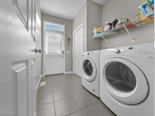 33 Amery Green, Crossfield, AB - Indoor Photo Showing Laundry Room