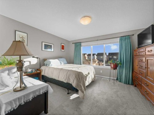 33 Amery Green, Crossfield, AB - Indoor Photo Showing Bedroom