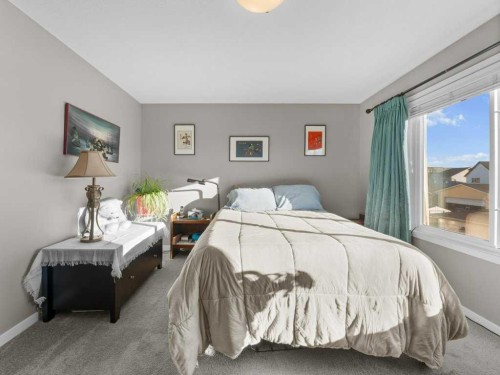 33 Amery Green, Crossfield, AB - Indoor Photo Showing Bedroom