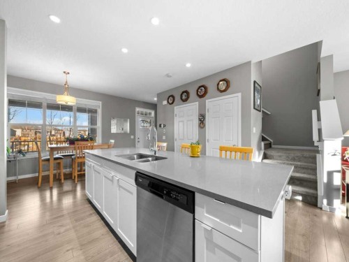 33 Amery Green, Crossfield, AB - Indoor Photo Showing Kitchen With Double Sink
