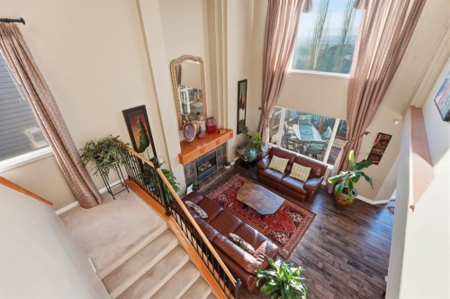 54 Rockbluff Close Nw, Calgary, AB - Indoor Photo Showing Other Room With Fireplace