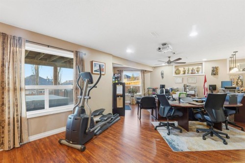 54 Rockbluff Close Nw, Calgary, AB - Indoor Photo Showing Gym Room