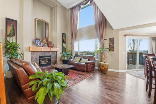 54 Rockbluff Close Nw, Calgary, AB - Indoor Photo Showing Living Room With Fireplace