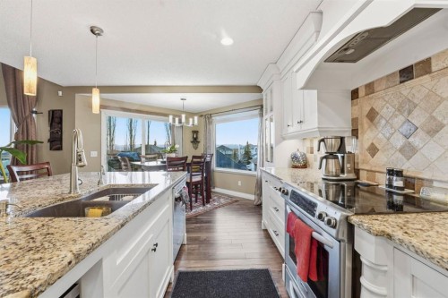 54 Rockbluff Close Nw, Calgary, AB - Indoor Photo Showing Kitchen With Double Sink With Upgraded Kitchen