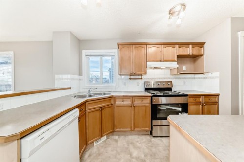 269 Covewood Circle Ne, Calgary, AB - Indoor Photo Showing Kitchen With Double Sink