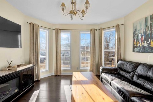 224 Prestwick Avenue Se, Calgary, AB - Indoor Photo Showing Living Room