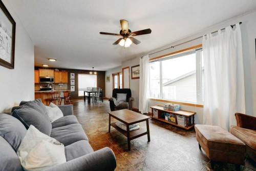 509 Country Meadows Street, Diamond Valley, AB - Indoor Photo Showing Living Room