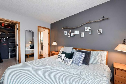 509 Country Meadows Street, Diamond Valley, AB - Indoor Photo Showing Bedroom