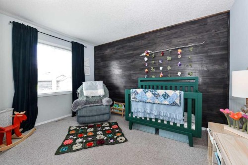 509 Country Meadows Street, Diamond Valley, AB - Indoor Photo Showing Bedroom