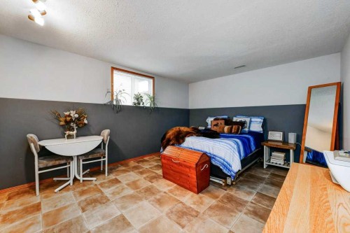 509 Country Meadows Street, Diamond Valley, AB - Indoor Photo Showing Bedroom