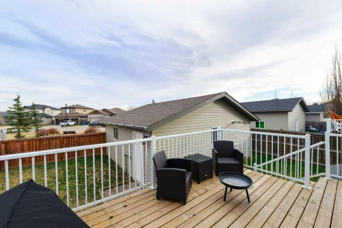509 Country Meadows Street, Diamond Valley, AB - Outdoor With Deck Patio Veranda With Exterior
