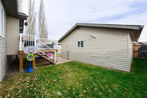 509 Country Meadows Street, Diamond Valley, AB - Outdoor With Exterior