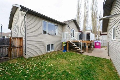 509 Country Meadows Street, Diamond Valley, AB - Outdoor With Deck Patio Veranda With Exterior