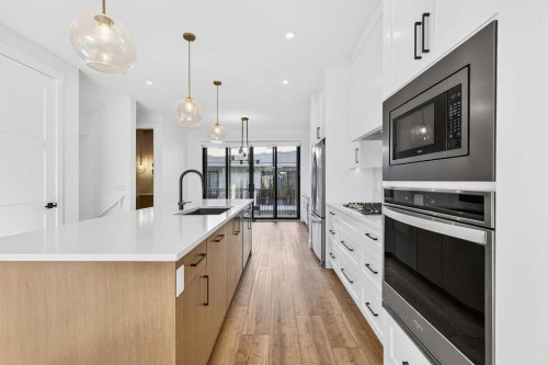 140 Discovery Drive Sw, Calgary, AB - Indoor Photo Showing Kitchen With Upgraded Kitchen