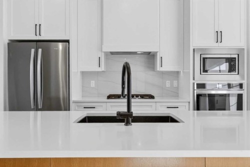 140 Discovery Drive Sw, Calgary, AB - Indoor Photo Showing Kitchen With Upgraded Kitchen