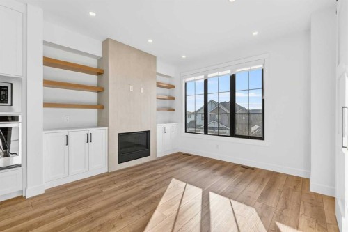 140 Discovery Drive Sw, Calgary, AB - Indoor With Fireplace