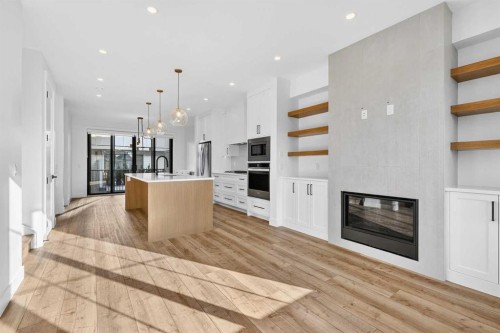 140 Discovery Drive Sw, Calgary, AB - Indoor With Fireplace