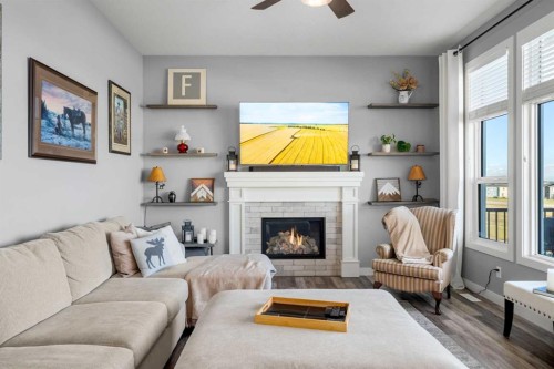 184 Ranch Road, Okotoks, AB - Indoor Photo Showing Living Room With Fireplace