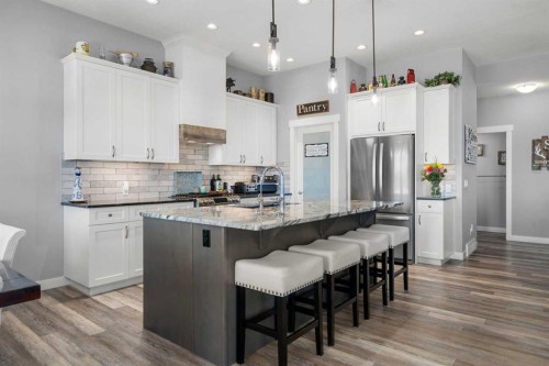 184 Ranch Road, Okotoks, AB - Indoor Photo Showing Kitchen With Stainless Steel Kitchen With Upgraded Kitchen