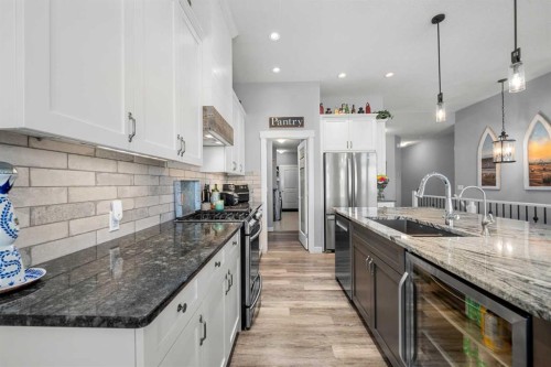 184 Ranch Road, Okotoks, AB - Indoor Photo Showing Kitchen With Stainless Steel Kitchen With Upgraded Kitchen