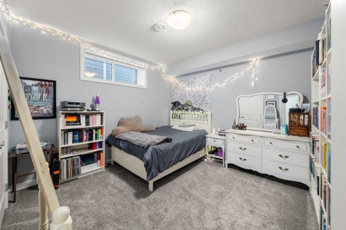 184 Ranch Road, Okotoks, AB - Indoor Photo Showing Bedroom