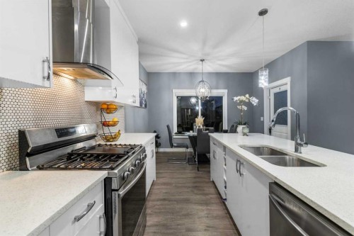 753 Edgefield Crescent, Strathmore, AB - Indoor Photo Showing Kitchen With Double Sink