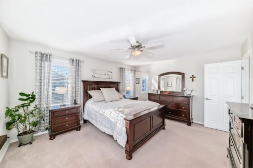 912 Windhaven Close Sw, Airdrie, AB - Indoor Photo Showing Bedroom