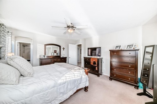912 Windhaven Close Sw, Airdrie, AB - Indoor Photo Showing Bedroom