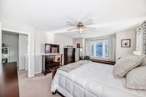 912 Windhaven Close Sw, Airdrie, AB - Indoor Photo Showing Bedroom