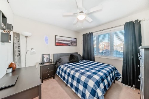 912 Windhaven Close Sw, Airdrie, AB - Indoor Photo Showing Bedroom