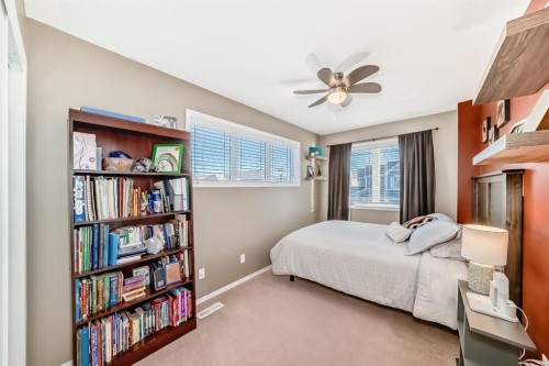 912 Windhaven Close Sw, Airdrie, AB - Indoor Photo Showing Bedroom