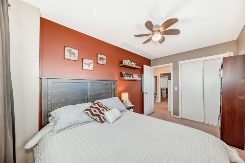 912 Windhaven Close Sw, Airdrie, AB - Indoor Photo Showing Bedroom