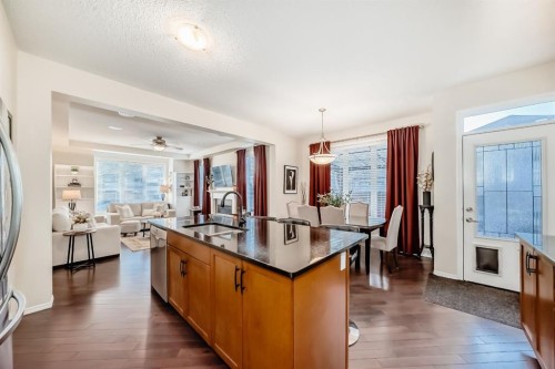 912 Windhaven Close Sw, Airdrie, AB - Indoor Photo Showing Kitchen With Double Sink
