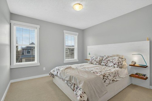 18 West Coach Road Sw, Calgary, AB - Indoor Photo Showing Bedroom