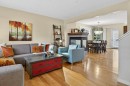 18 West Coach Road Sw, Calgary, AB  - Indoor Photo Showing Living Room With Fireplace 