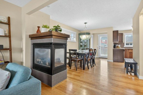 18 West Coach Road Sw, Calgary, AB - Indoor With Fireplace