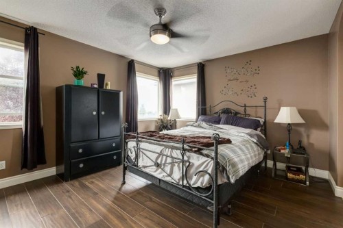 169 Tuscany Ridge Park Nw, Calgary, AB - Indoor Photo Showing Bedroom