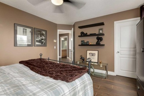 169 Tuscany Ridge Park Nw, Calgary, AB - Indoor Photo Showing Bedroom