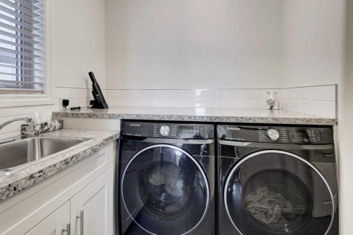 436 Evergreen Circle Sw, Calgary, AB - Indoor Photo Showing Laundry Room