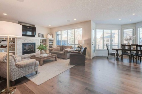 436 Evergreen Circle Sw, Calgary, AB - Indoor Photo Showing Living Room With Fireplace