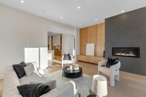 1321 10 Avenue Se, Calgary, AB - Indoor Photo Showing Living Room With Fireplace