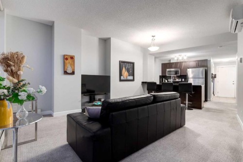 1603-325 3 Street Se, Calgary, AB - Indoor Photo Showing Living Room
