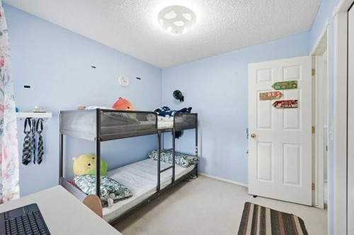 1009 Country Hills Circle Nw, Calgary, AB - Indoor Photo Showing Bedroom
