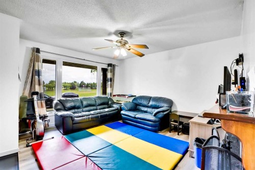 48 Templeridge Crescent Ne, Calgary, AB - Indoor Photo Showing Living Room