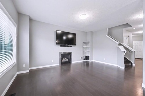 52 Skyview Point Terrace Ne, Calgary, AB - Indoor Photo Showing Other Room With Fireplace