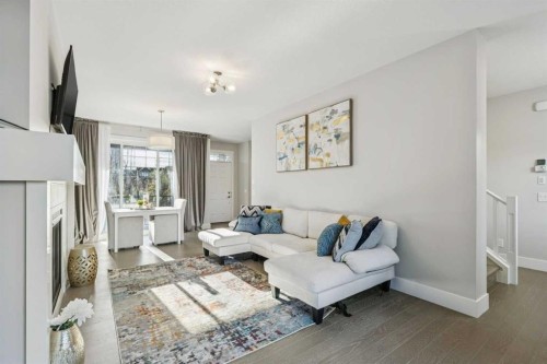 16 Treeline Lane Sw, Calgary, AB - Indoor Photo Showing Living Room