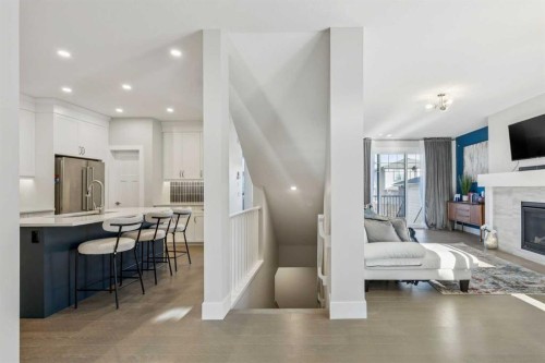 16 Treeline Lane Sw, Calgary, AB - Indoor Photo Showing Other Room With Fireplace