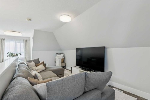 16 Treeline Lane Sw, Calgary, AB - Indoor Photo Showing Living Room