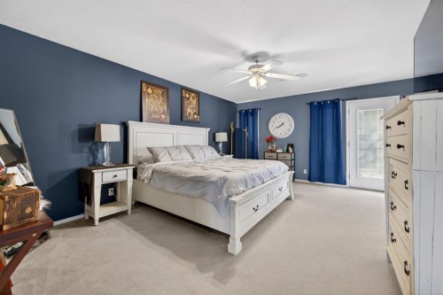 10 Willow Springs Crescent, Sylvan Lake, AB - Indoor Photo Showing Bedroom